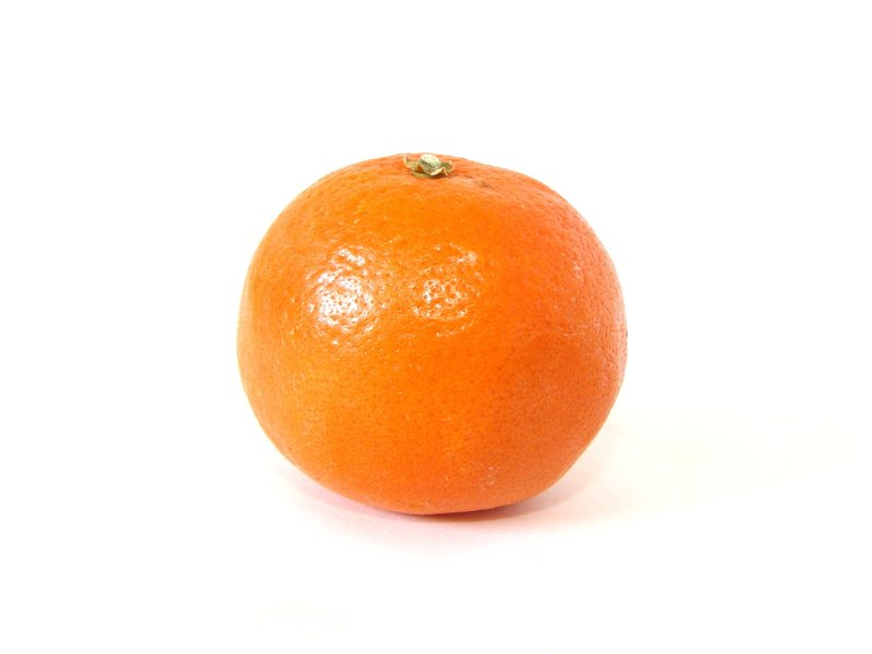 A single whole mandarin orange on a white background